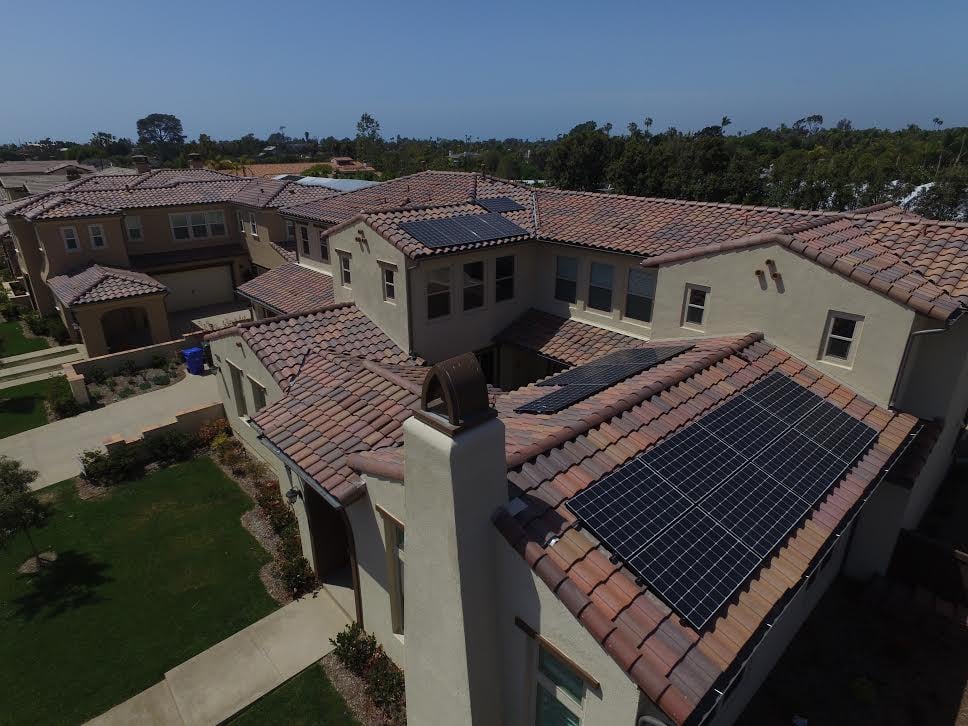 Solar panels on a large tile roof home