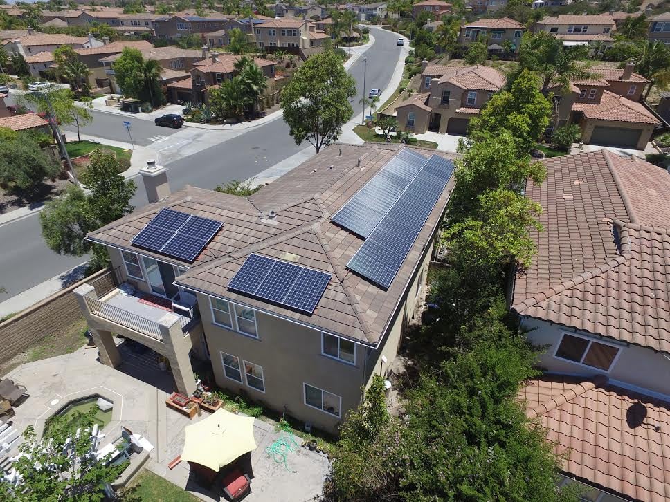 Aerial view of a San Diego home with rooftop solar panels